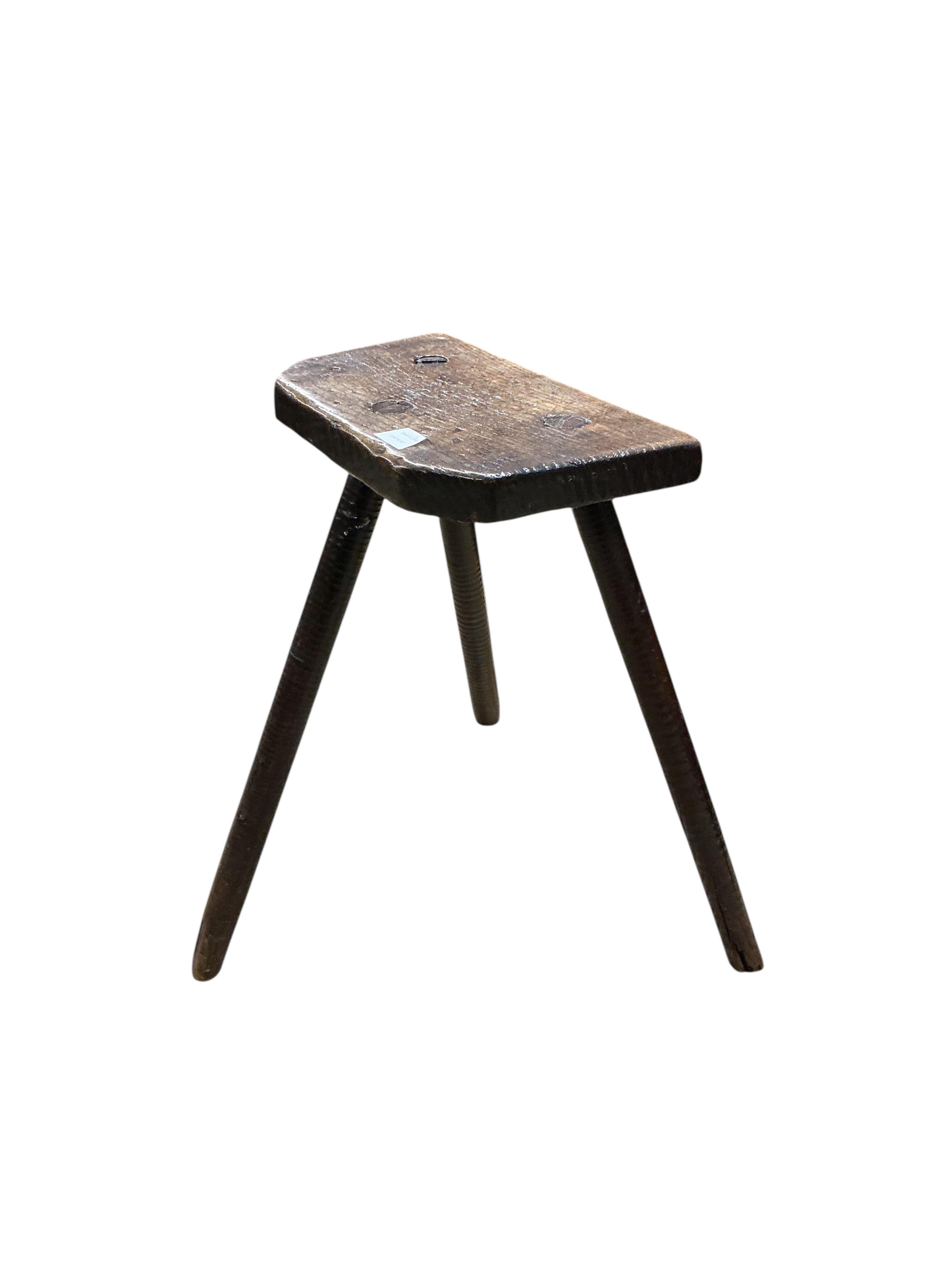 A late 18th /early 19th century oak Sheffield cutler's stool, width 39cm, depth 23cm, height 59cm